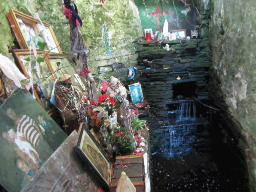 image showing the reality of offerings at a sacred site, Showing a mess made by visitors.
